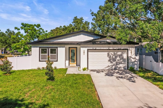 view of front of home with an attached garage and driveway