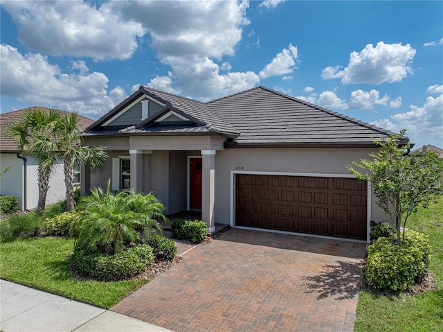 31510 Cabana Rye Ave, San Antonio, FL 33576 - ranch-style home featuring decorative driveway, stucco siding, and an attached garage