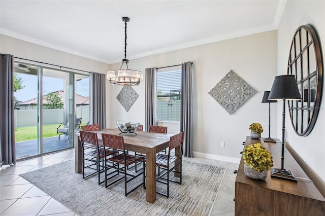 31510 Cabana Rye Ave, San Antonio, FL 33576 - dining area with a chandelier, light tile patterned flooring, and ornamental molding