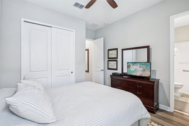 31510 Cabana Rye Ave, San Antonio, FL 33576 - bedroom with wood finished floors, a closet, ensuite bath, and ceiling fan