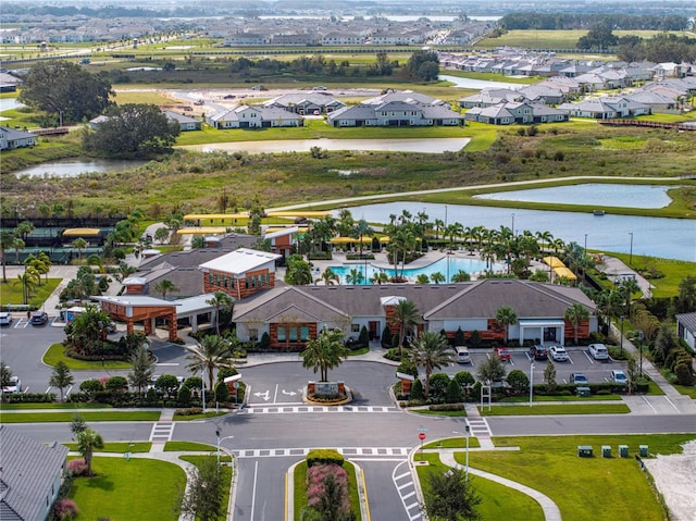 31510 Cabana Rye Ave, San Antonio, FL 33576 - aerial perspective of suburban area with a pool area and a large body of water