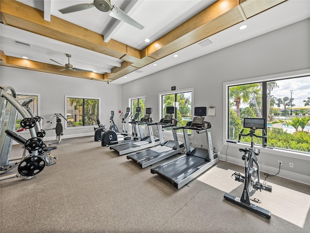 31510 Cabana Rye Ave, San Antonio, FL 33576 - gym featuring ceiling fan, beamed ceiling, recessed lighting, and carpet