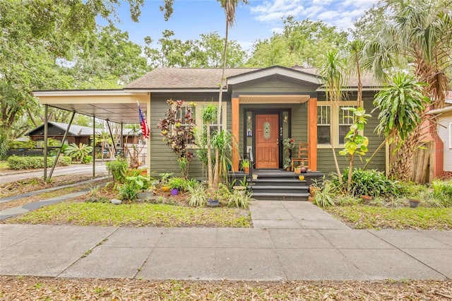 916 E Broad St, Tampa, FL 33604 - view of front of home with a carport