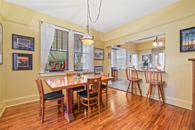 916 E Broad St, Tampa, FL 33604 - dining area with light wood finished floors, healthy amount of natural light, and baseboards