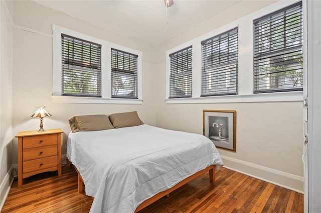 916 E Broad St, Tampa, FL 33604 - bedroom featuring hardwood / wood-style floors and baseboards