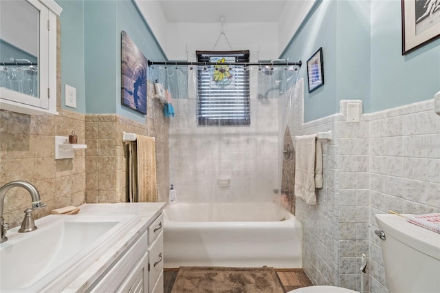 916 E Broad St, Tampa, FL 33604 - bathroom with tile walls, toilet, shower / tub combo with curtain, vanity, and wainscoting