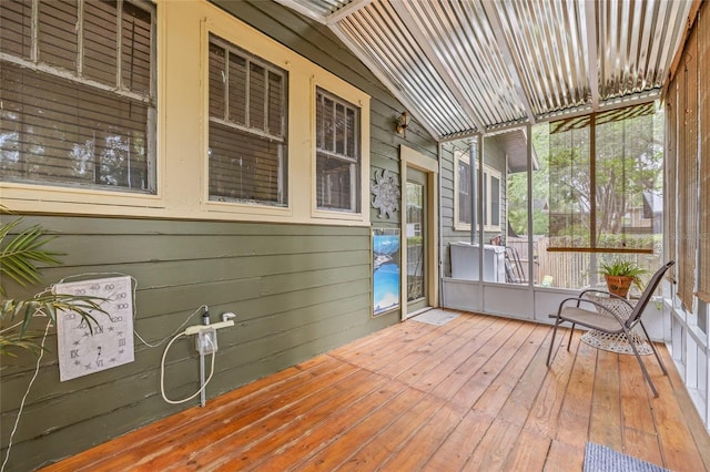 916 E Broad St, Tampa, FL 33604 - unfurnished sunroom featuring vaulted ceiling