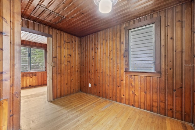 916 E Broad St, Tampa, FL 33604 - empty room featuring wooden walls and wood-type flooring