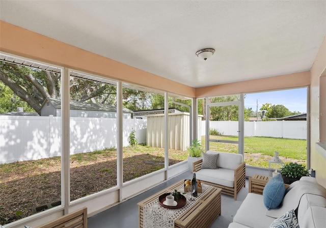 sunroom / solarium featuring an outdoor living space