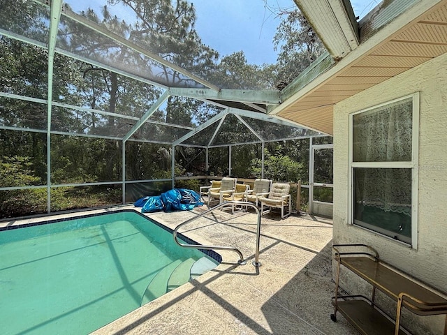 2995 N Bravo Dr, Beverly Hills, FL 34465 - outdoor pool with a patio area and glass enclosure