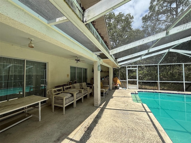 2995 N Bravo Dr, Beverly Hills, FL 34465 - outdoor pool featuring an outdoor living space, a patio area, ceiling fan, and glass enclosure