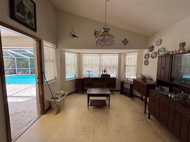 2995 N Bravo Dr, Beverly Hills, FL 34465 - office with a textured ceiling, light floors, baseboards, and high vaulted ceiling