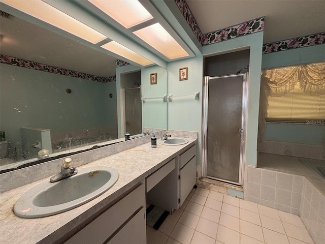 2995 N Bravo Dr, Beverly Hills, FL 34465 - full bathroom with a stall shower, tile patterned flooring, and double vanity
