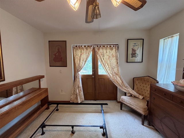 2995 N Bravo Dr, Beverly Hills, FL 34465 - foyer entrance with ceiling fan, light colored carpet, and baseboards