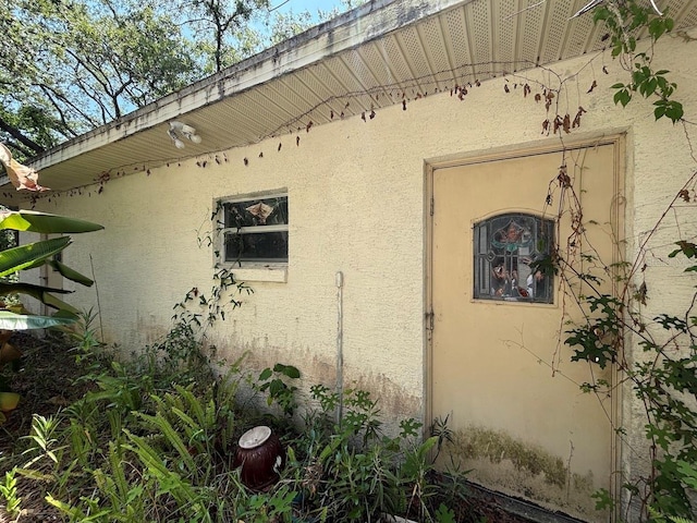2995 N Bravo Dr, Beverly Hills, FL 34465 - view of side of home featuring stucco siding