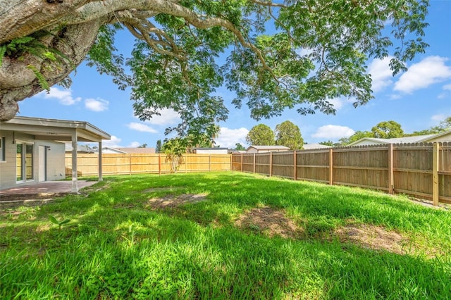 7400 Belvedere Ter, New Port Richey, FL 34655 - view of yard featuring a patio area
