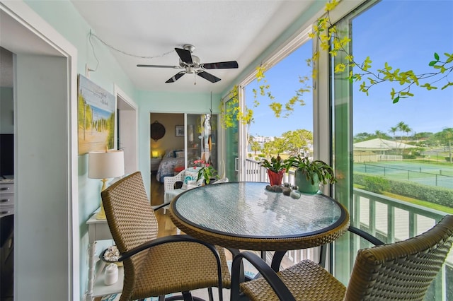 10216 Regal Dr Unit 310, Largo, FL 33774 - sunroom featuring ceiling fan and wood finished floors