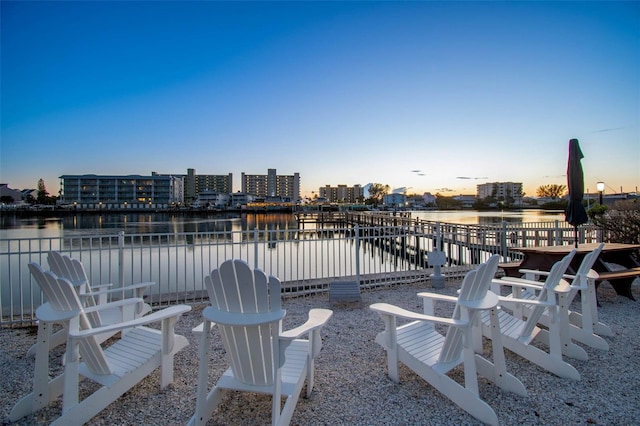 10216 Regal Dr Unit 310, Largo, FL 33774 - patio terrace at dusk with a water view and a view of city