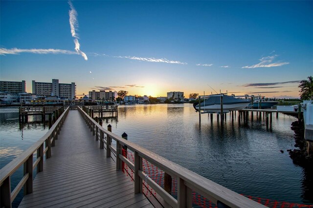 10216 Regal Dr Unit 310, Largo, FL 33774 - dock with boat lift and a water view