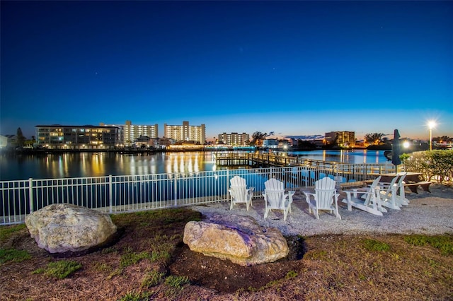 10216 Regal Dr Unit 310, Largo, FL 33774 - exterior space with fence and a water view