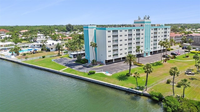 10216 Regal Dr Unit 310, Largo, FL 33774 - drone / aerial view of a large body of water and apartment complex / building