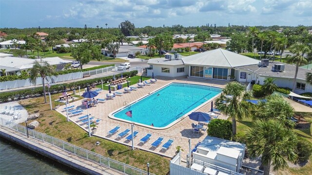 10216 Regal Dr Unit 310, Largo, FL 33774 - community pool featuring fence and central air condition unit