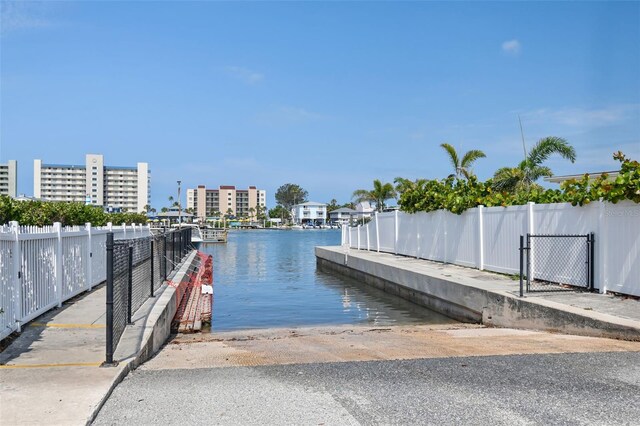 10216 Regal Dr Unit 310, Largo, FL 33774 - dock area featuring a boat ramp and a water view