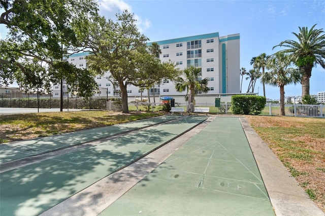 10216 Regal Dr Unit 310, Largo, FL 33774 - surrounding community with shuffleboard and fence