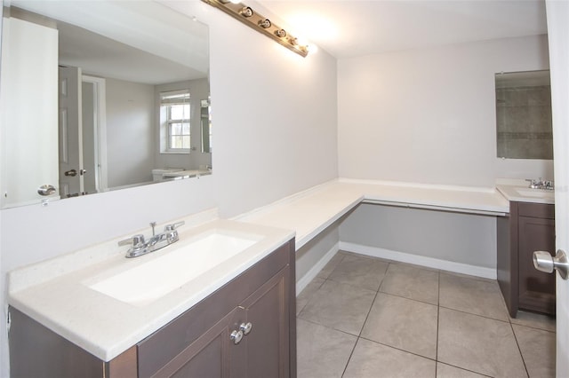 9816 Crofton Ln, Port Richey, FL 34668 - bathroom featuring vanity, tile patterned floors, and baseboards