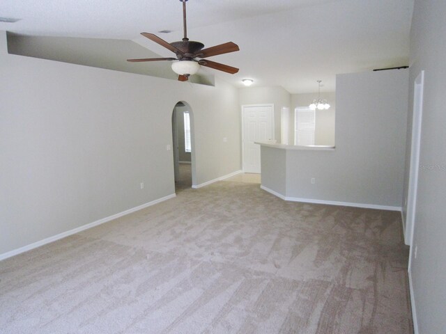 24741 Ravello St, Land O Lakes, FL 34639 - unfurnished room with ceiling fan, light colored carpet, arched walkways, plenty of natural light, and lofted ceiling