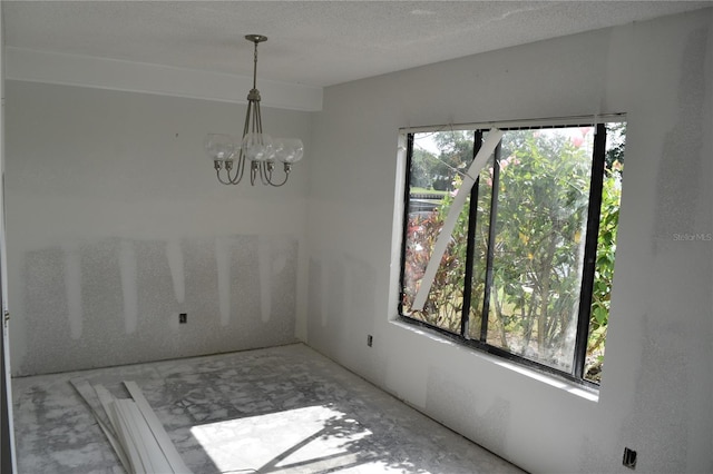 420 Moorings Cove Dr Unit 420, Tarpon Springs, FL 34689 - unfurnished dining area with a chandelier