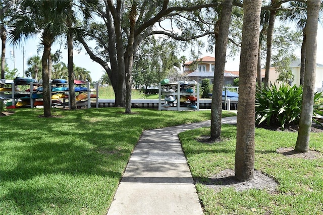 420 Moorings Cove Dr Unit 420, Tarpon Springs, FL 34689 - view of home's community with a yard