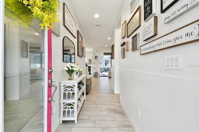 hallway with recessed lighting