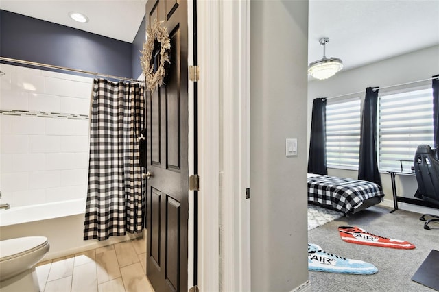 full bathroom with shower / tub combo with curtain, toilet, and recessed lighting