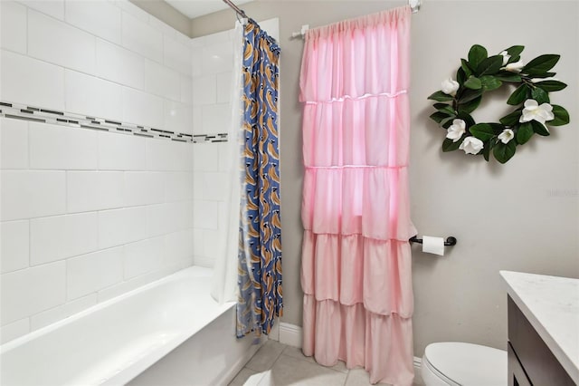 full bath with tile patterned flooring, vanity, toilet, shower / bath combo with shower curtain, and baseboards