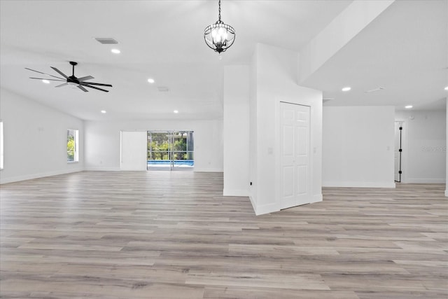 5507 Nimitz Rd, New Port Richey, FL 34652 - unfurnished living room with light wood finished floors, recessed lighting, baseboards, and a ceiling fan