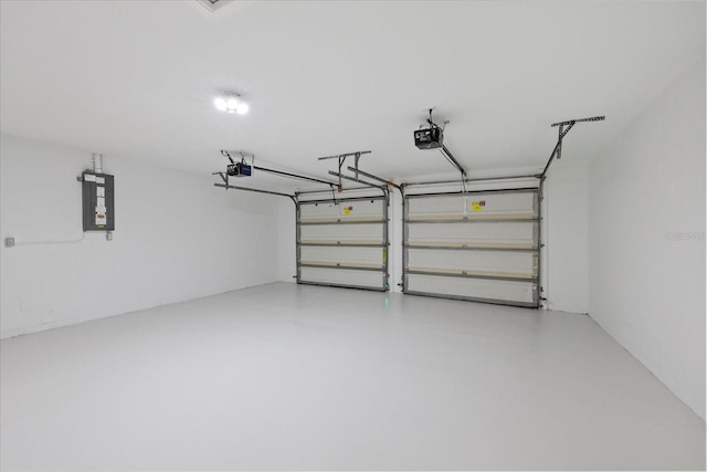 5507 Nimitz Rd, New Port Richey, FL 34652 - garage with a garage door opener and electric panel