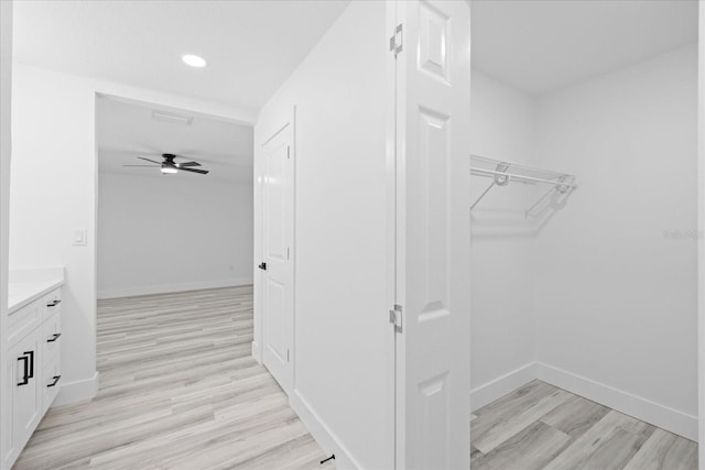 5507 Nimitz Rd, New Port Richey, FL 34652 - hall with light wood-style floors, baseboards, and recessed lighting