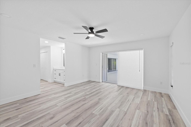 5507 Nimitz Rd, New Port Richey, FL 34652 - spare room featuring ceiling fan, light wood-type flooring, and baseboards