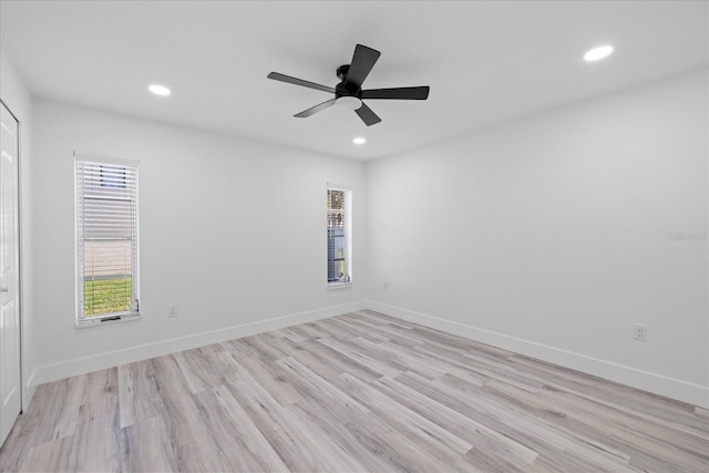 5507 Nimitz Rd, New Port Richey, FL 34652 - empty room with recessed lighting, light wood finished floors, a ceiling fan, and baseboards