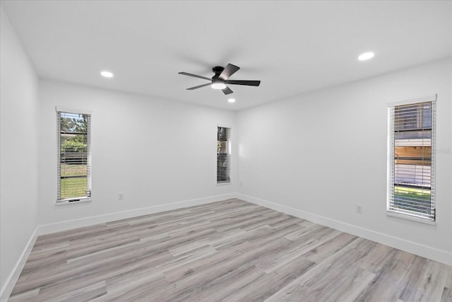 5507 Nimitz Rd, New Port Richey, FL 34652 - unfurnished room with ceiling fan, recessed lighting, light wood finished floors, and baseboards