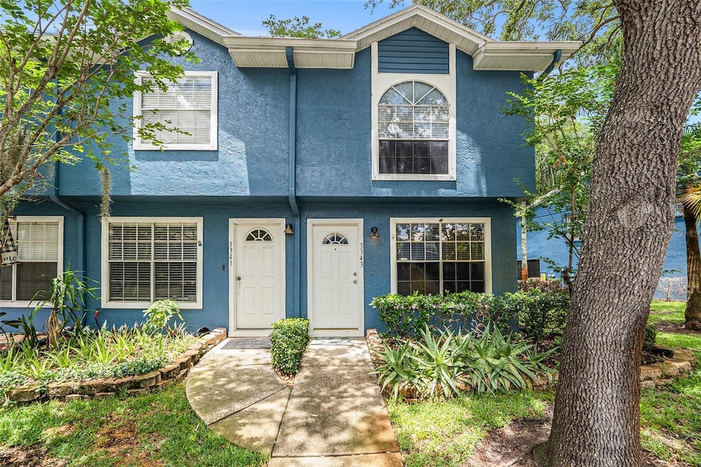 3343 Fox Hunt Dr, Palm Harbor, FL 34683 - view of property featuring stucco siding