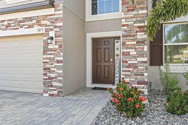 3071 Marine Grass Dr, Wimauma, FL 33598 - entrance to property with stucco siding and stone siding