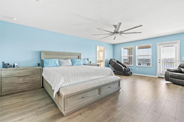 3071 Marine Grass Dr, Wimauma, FL 33598 - bedroom with light wood finished floors, access to outside, ceiling fan, and baseboards