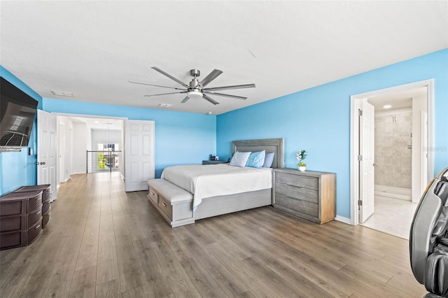 3071 Marine Grass Dr, Wimauma, FL 33598 - bedroom featuring wood finished floors, baseboards, and ceiling fan