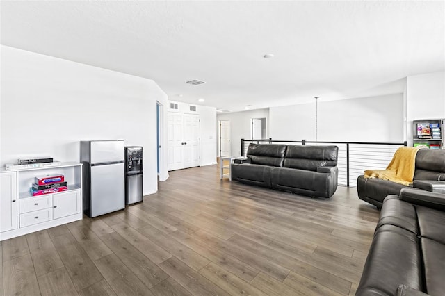 3071 Marine Grass Dr, Wimauma, FL 33598 - living area with dark wood finished floors and recessed lighting