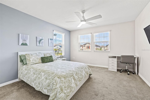 3071 Marine Grass Dr, Wimauma, FL 33598 - carpeted bedroom featuring an office area, baseboards, and ceiling fan