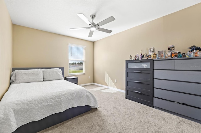 3071 Marine Grass Dr, Wimauma, FL 33598 - carpeted bedroom with baseboards and ceiling fan