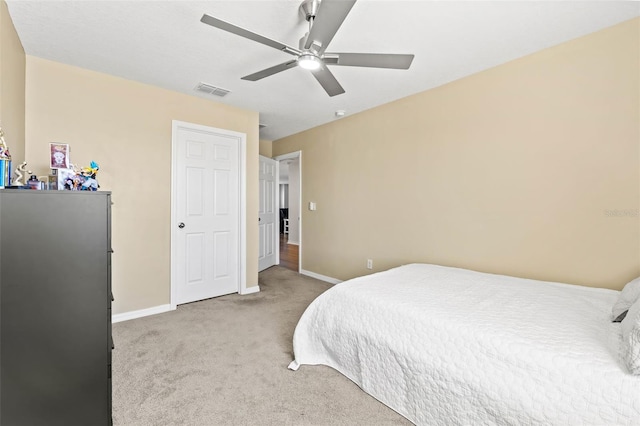 3071 Marine Grass Dr, Wimauma, FL 33598 - bedroom featuring light colored carpet, baseboards, and a ceiling fan