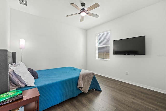 3071 Marine Grass Dr, Wimauma, FL 33598 - bedroom with wood finished floors, baseboards, and a ceiling fan